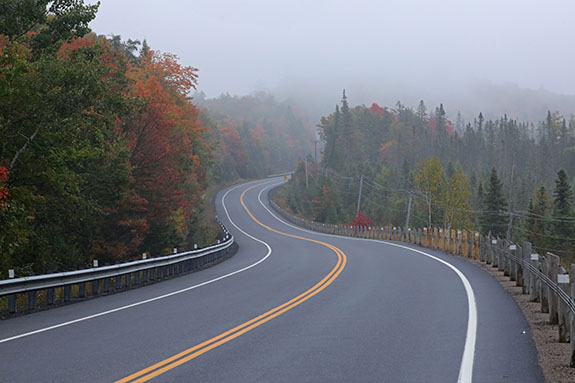 Foggy morning approaching the West Gate along Highway 60 in Algonquin Park on September 23, 2025 (click to enlarge). 